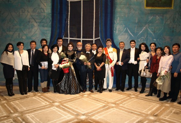 UYANGA, N.Sanchir's wife (2nd from left); N.Sanchir and Conductor Burenbekh (centre); with principal and other performing artists of The Mongolian State Academic Theatre of Opera and Ballet after the performance of Eugene Onegin. Ulaanbaator 7 December 2013