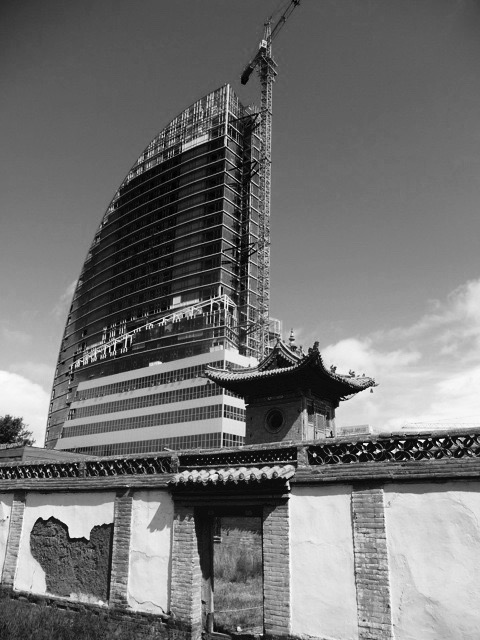 Architectural counterpoint: the Choijin Lama Temple and post-soviet socialist structural modernity in Ulanbaator. Photo: C.Pleteshner (24 October 2010)