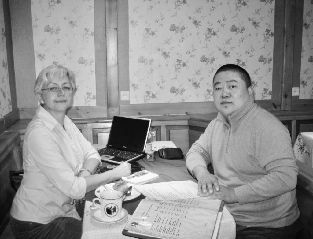 CP and Dugarjav Bilguun at the German Coffee House on Baga Toroo located between The Zanabazaar Fine Arts Museum and UN House in downtown Ulan Bator. 16 August 2009. Photo: C.Pleteshner Mongolia Archive