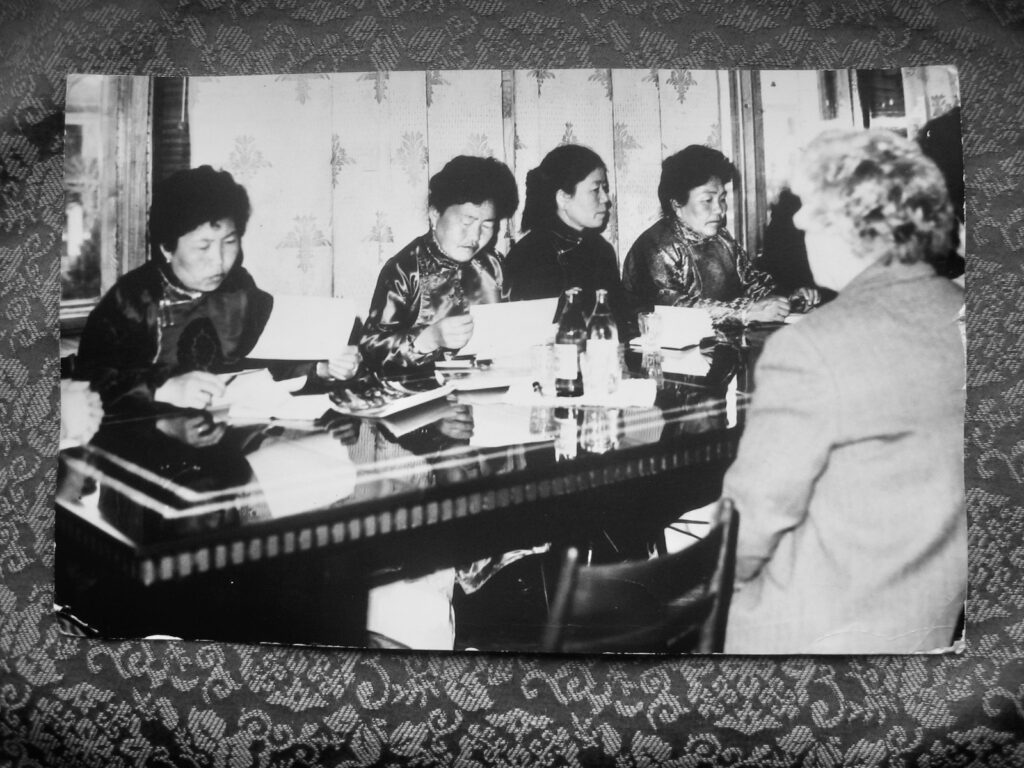 Visiting the sewing factory in Khakhasia in 1985. Photo 1 of 2. Handmaa (third from left). Photograph courtesy of J.Avrazed. Reprinted on CPinMongolia.com with permission.
